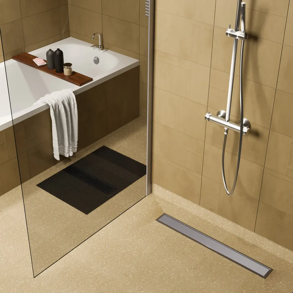 Walk-in shower with a vinyl floor and a linear clamp drain along the wall